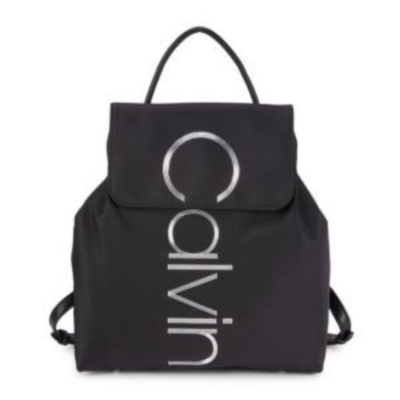 Calvin Klein Handbags - NWT Calvin Klein Logo Embellished Nylon Mini Backpack